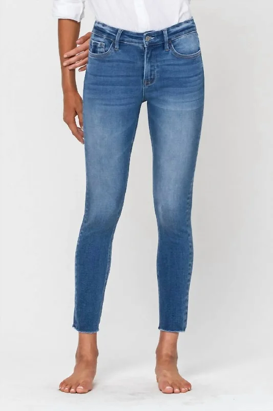Simon Mid Rise Raw Hem Skinny Jean In Medium WashEverything Must Go!