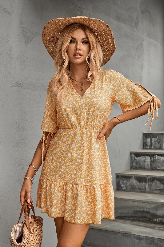 Floral V-neck mini dress with sheer tiesBiggest Sale of the Season!