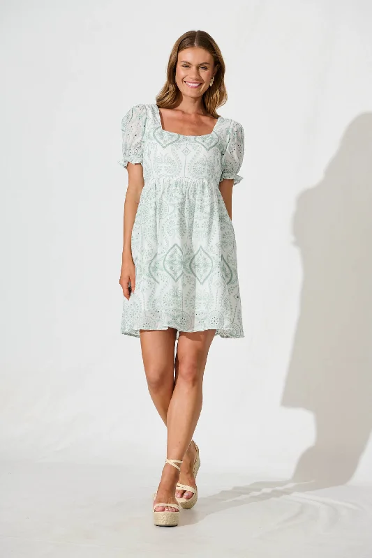 Emmanuelle Dress In White With Green BroderieDon’t Wait – Shop Today!