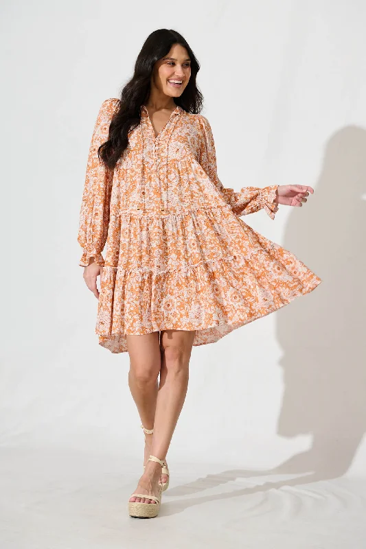 Gene Smock Dress in White and Orange FloralHurry! While Supplies Last!