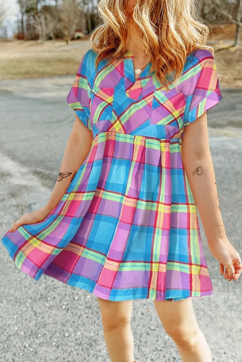 Plaid mini dress with pocketsShop the Hottest Deals!