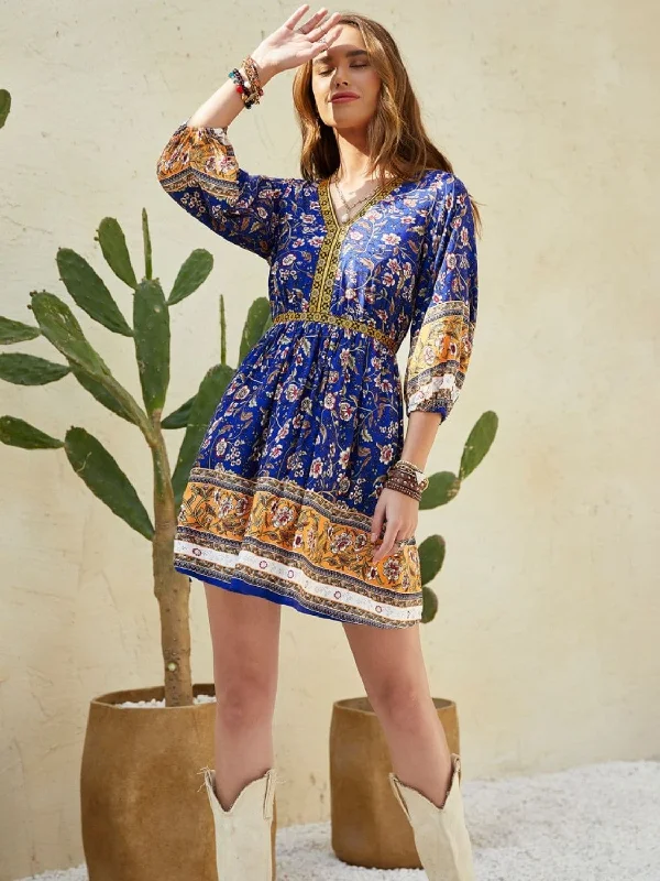 Chic v-neck mini dress in viscoseShop Before It’s Gone!