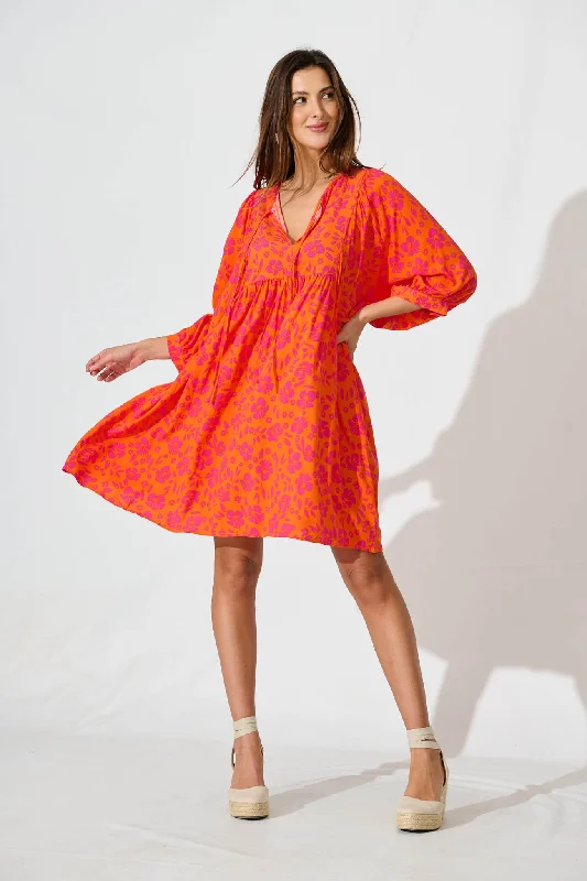 Spring Morning Smock Dress In Orange With Pink FloralExclusive Savings This Week!