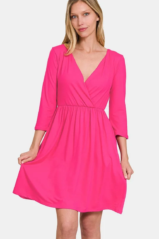 Elegant surplice dress with pockets and three-quarter sleevesSave More with Every Purchase!